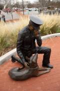 Kneeling Officer and K9 - Police Memorial at Mount Holly NC by Ed Walker